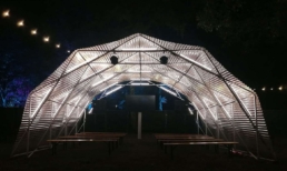 A scissor structure with light design by A03 for a stage by night.